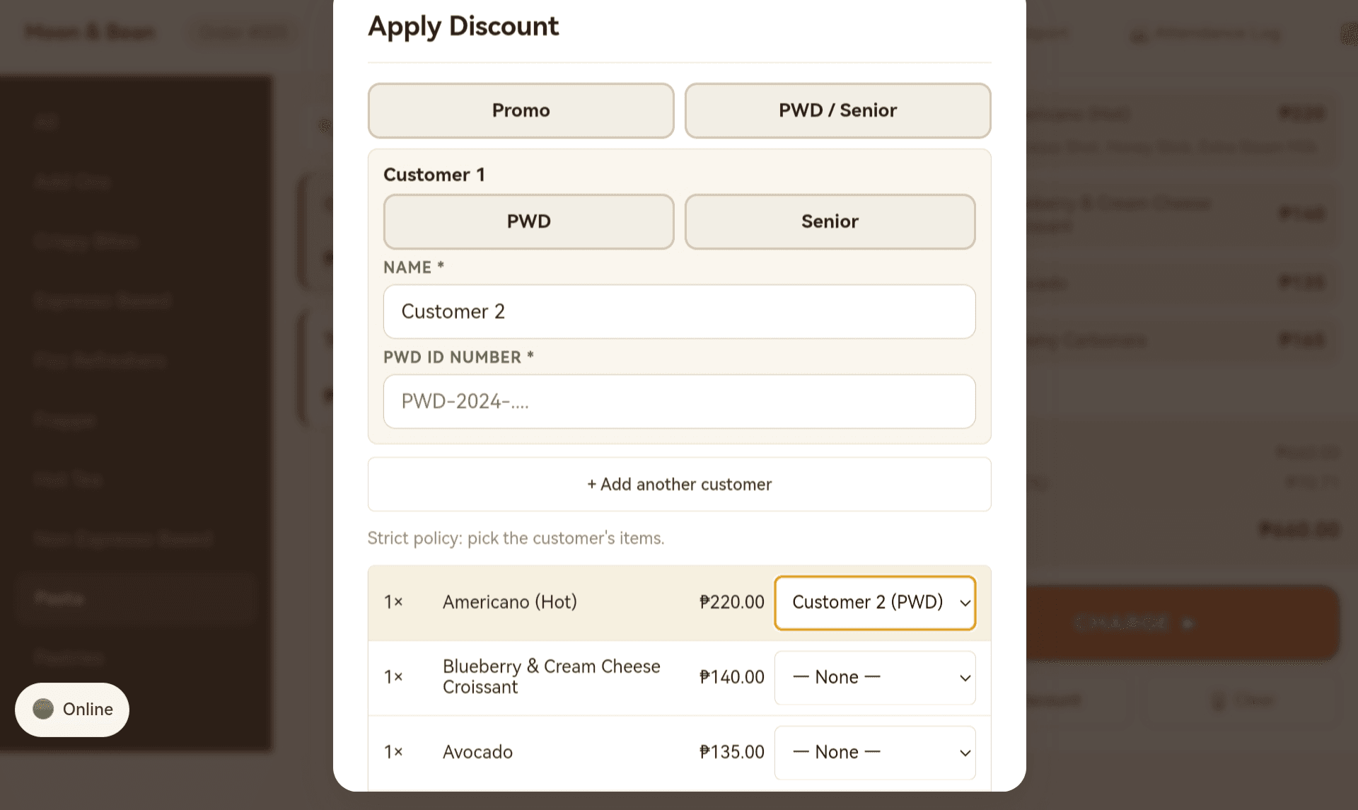 The Apply Discount dialog on the till — Promo / PWD / Senior selector at the top, a per-customer block with name and PWD ID number, and a per-line attribution table where each cart item is assigned to a specific customer or left unassigned.